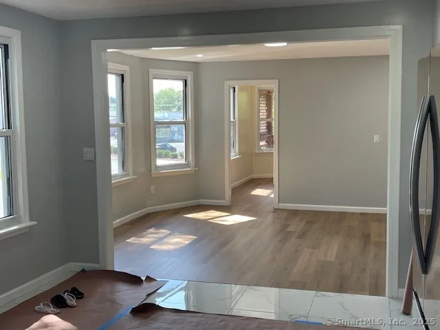 an empty room with windows
