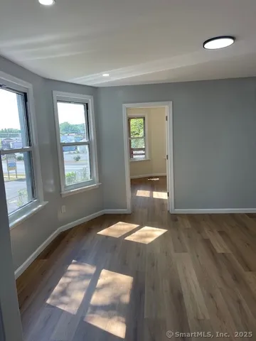 a view of an empty room and window