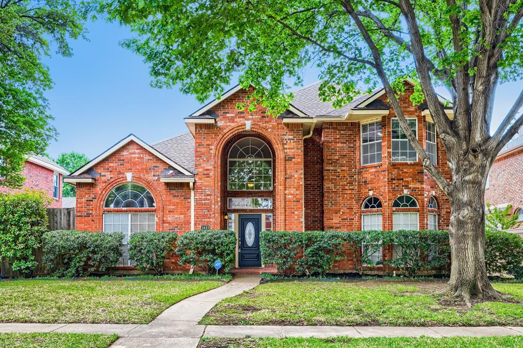 front view of house with a yard