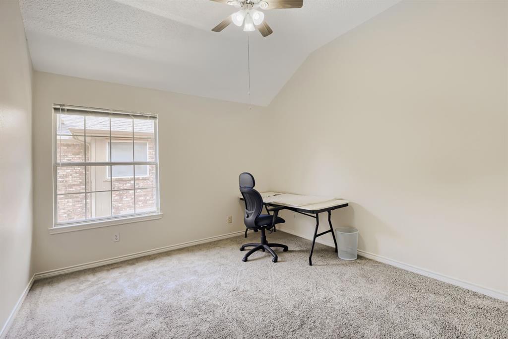 1413 West Peters Colony Road Carrollton, TX 75007 - Photo 23 of 29 a view of a workspace with furniture and a window
