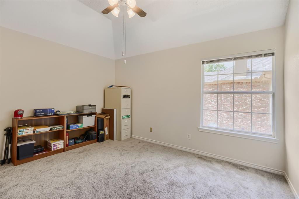 1413 West Peters Colony Road Carrollton, TX 75007 - Photo 24 of 29 a view of a workspace with furniture and a window