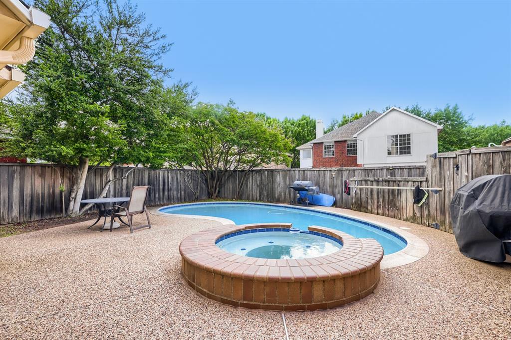 1413 West Peters Colony Road Carrollton, TX 75007 - Photo 26 of 29 a view of house with outdoor seating area