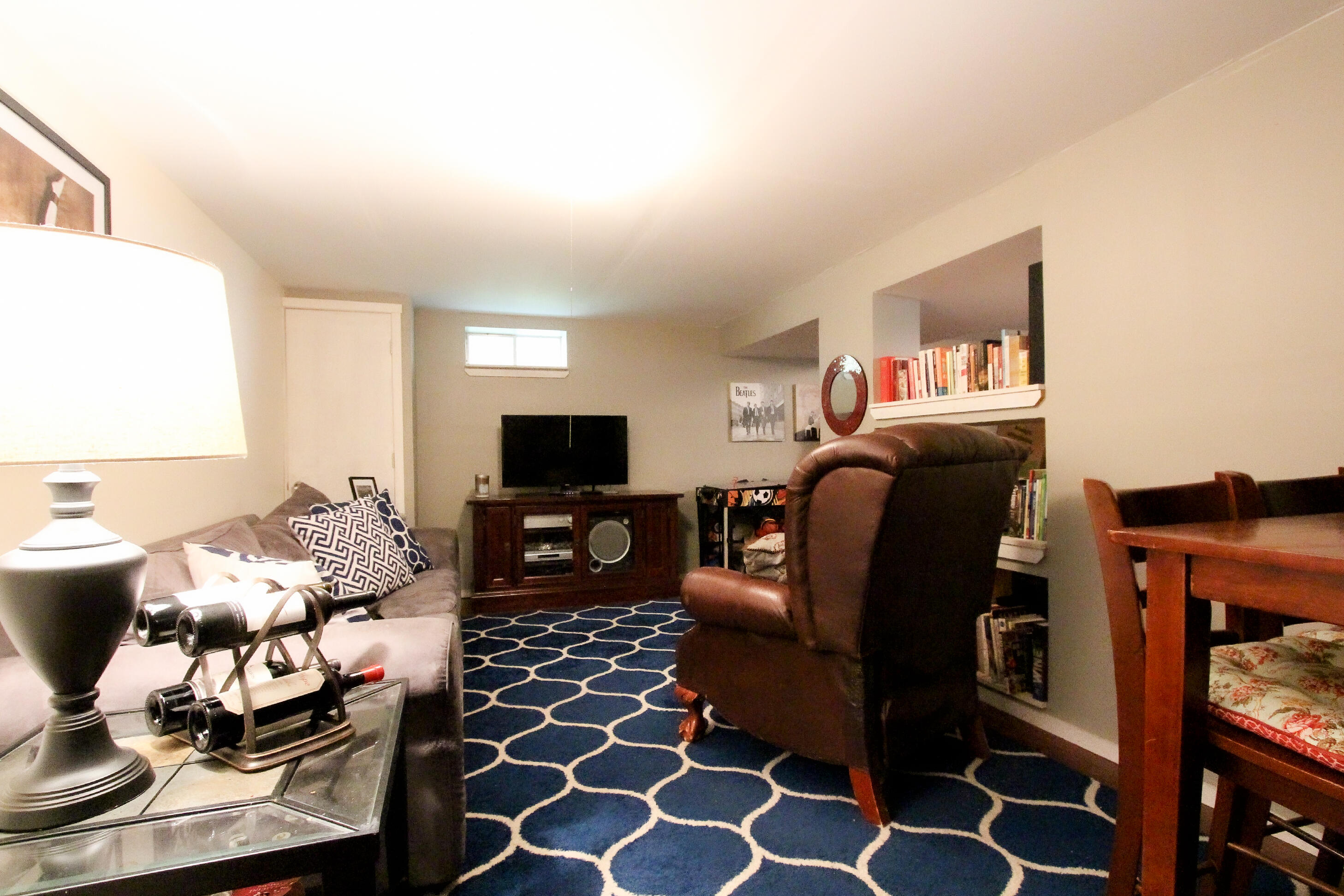50 Ensign Road Centerville, MA 02632 - Photo 14 of 21 a living room with furniture a rug and a flat screen tv
