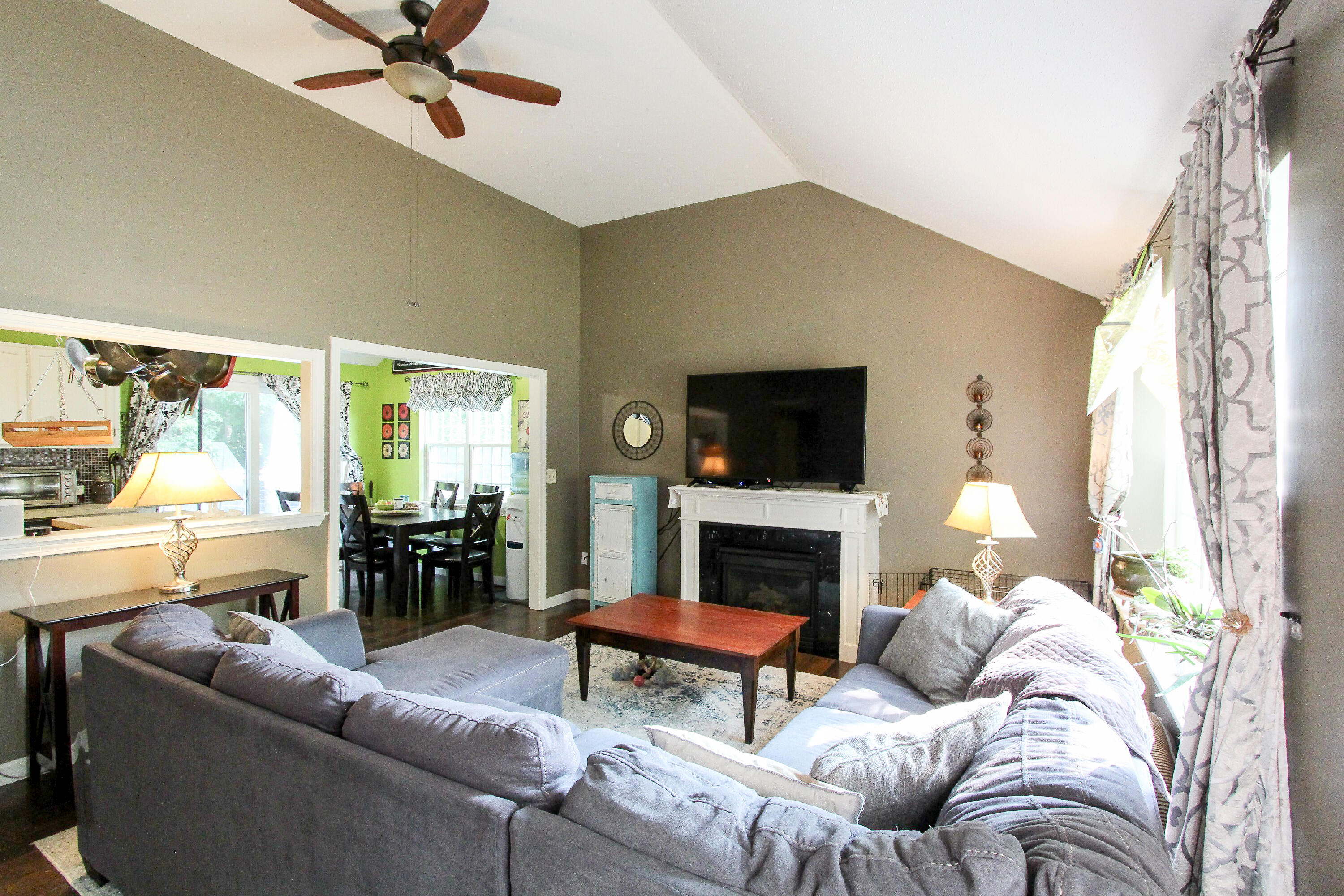50 Ensign Road Centerville, MA 02632 - Photo 5 of 21 a living room with furniture and a fireplace