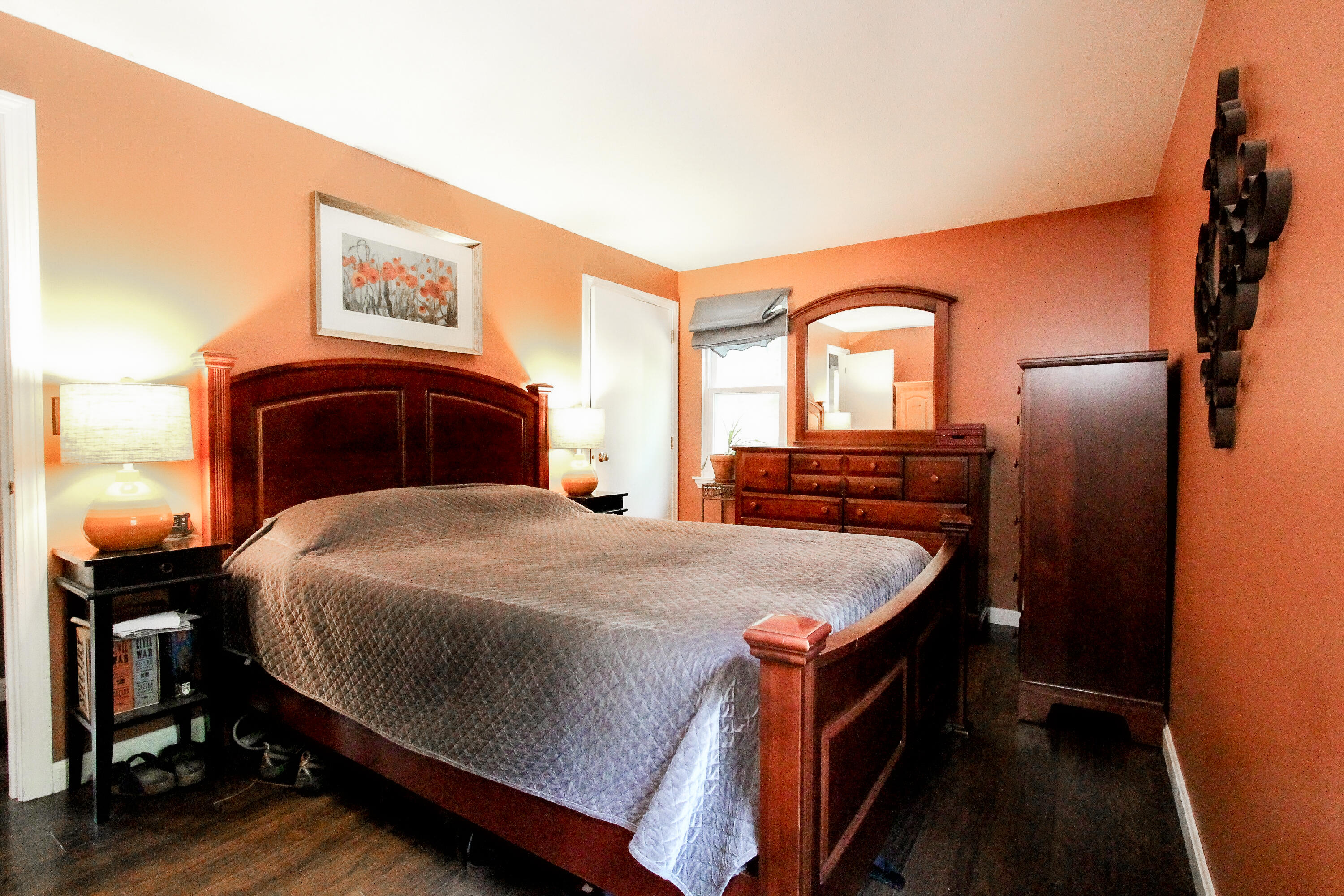 50 Ensign Road Centerville, MA 02632 - Photo 10 of 21 a bedroom with a bed and a mirror on dresser
