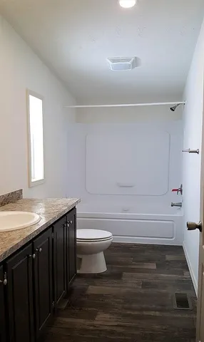 a view of a kitchen with a sink