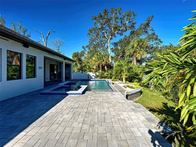 a view of a yard with an outdoor space