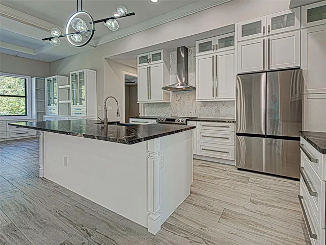 a utility room with sink dryer and washer