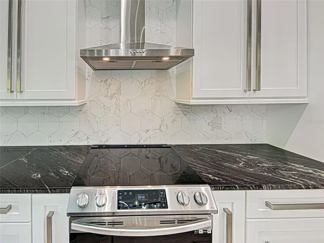 an empty room with wooden floor