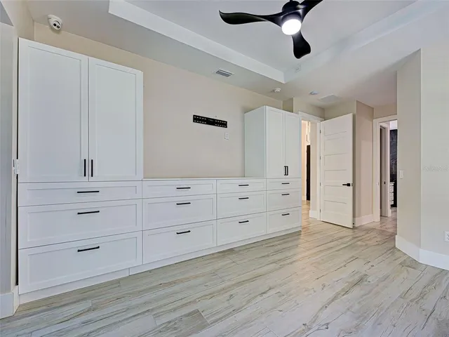 a view of a backyard with sitting area