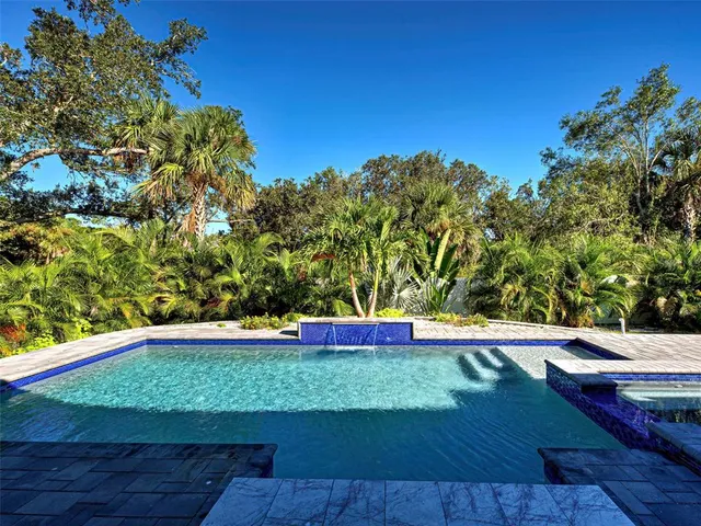 a view of a yard with an outdoor space