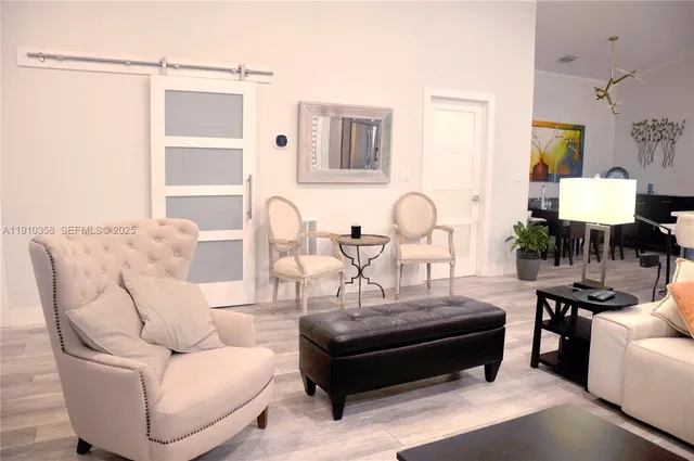 a living room with furniture and a table