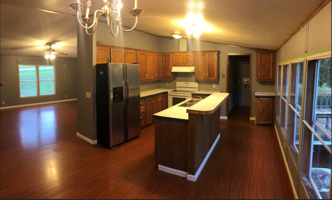 173 Roberts Road Portland, TN 37148 - Photo 6 of 7 a kitchen with counter top space and stainless steel appliances