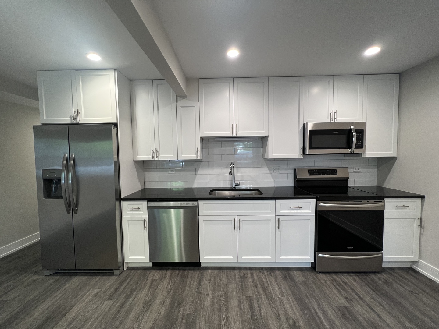 Undisclosed Address Chicago, IL 60640 - Photo 2 of 15 a kitchen with stainless steel appliances granite countertop a stove a sink and a refrigerator