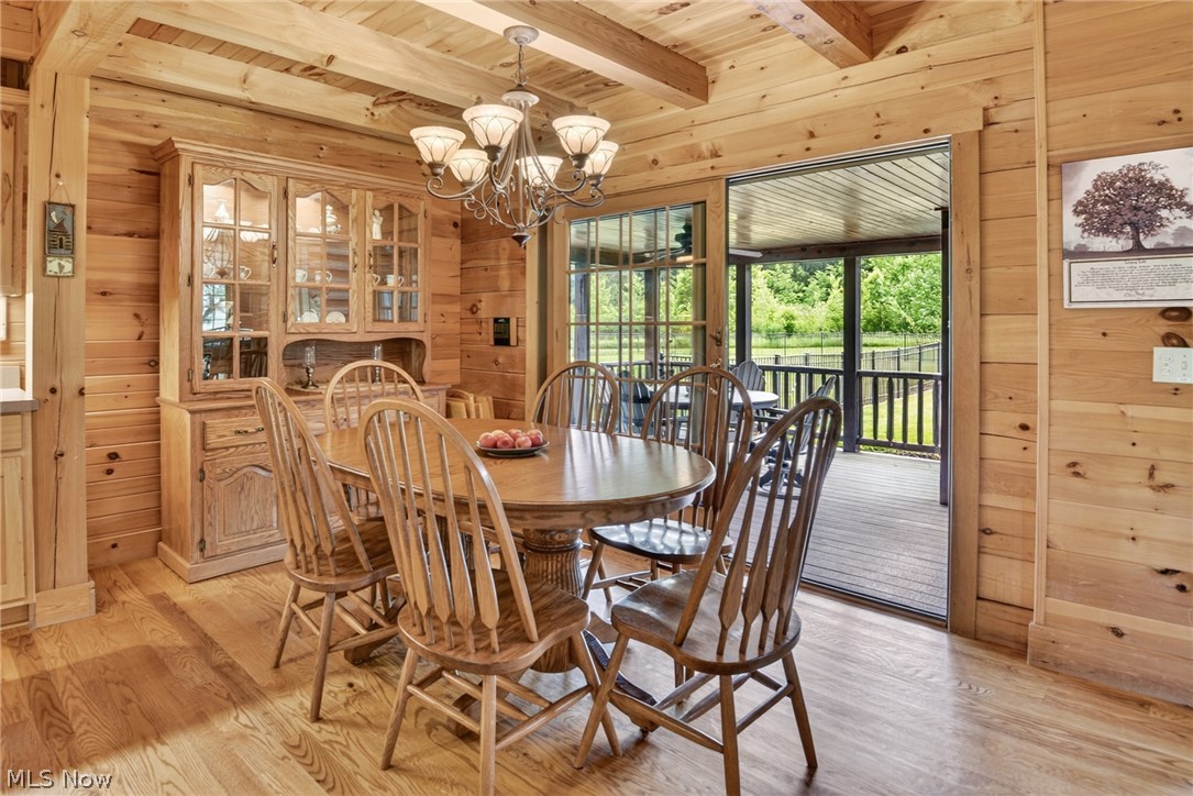 16727 Pitts Road Wellington, OH 44090 - Photo 8 of 50 Dining area with patio doors leading to covered porch