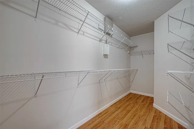 a view of a room with racks on the wall