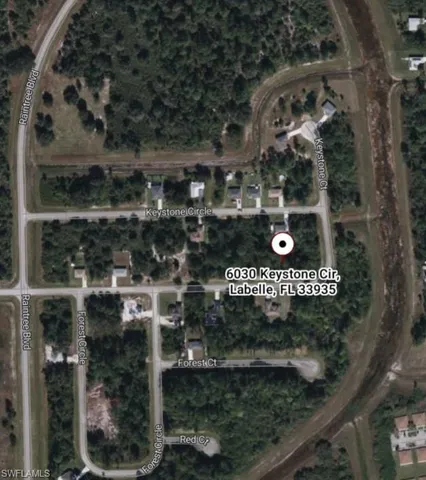 a sign broad on the side of the road