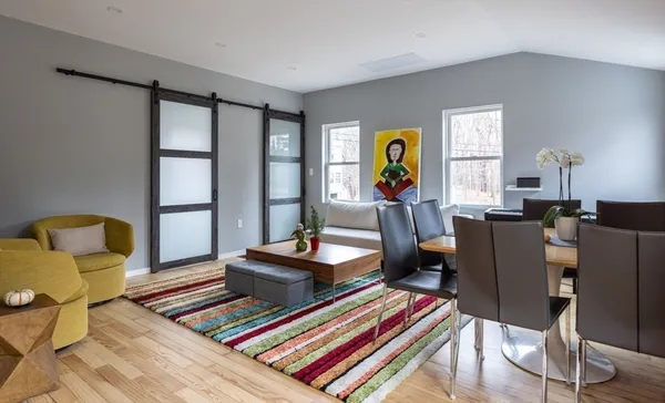 a living room with furniture and a window