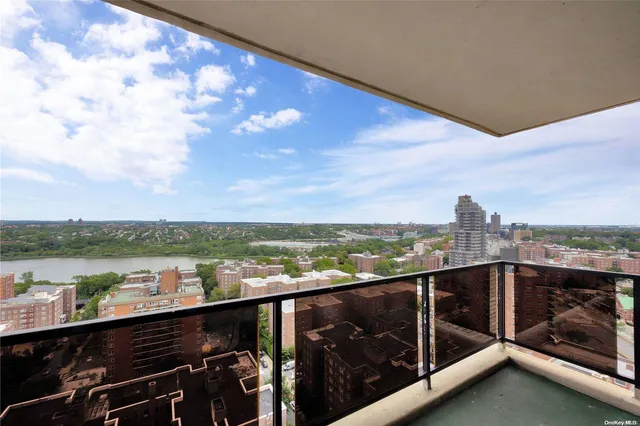 a view of a city skyline from a balcony
