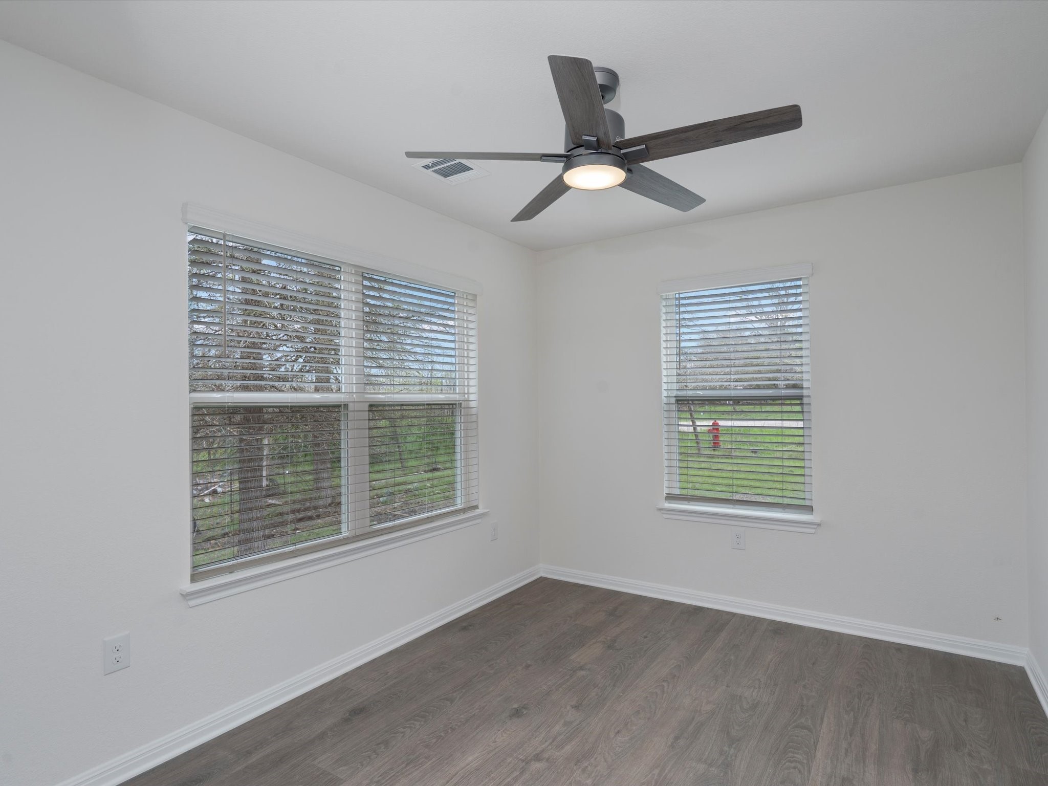 21007 Coleman Branch Creek Road Manor, TX 78653 - Photo 15 of 30 Additional bedroom with closet storage and natural light.