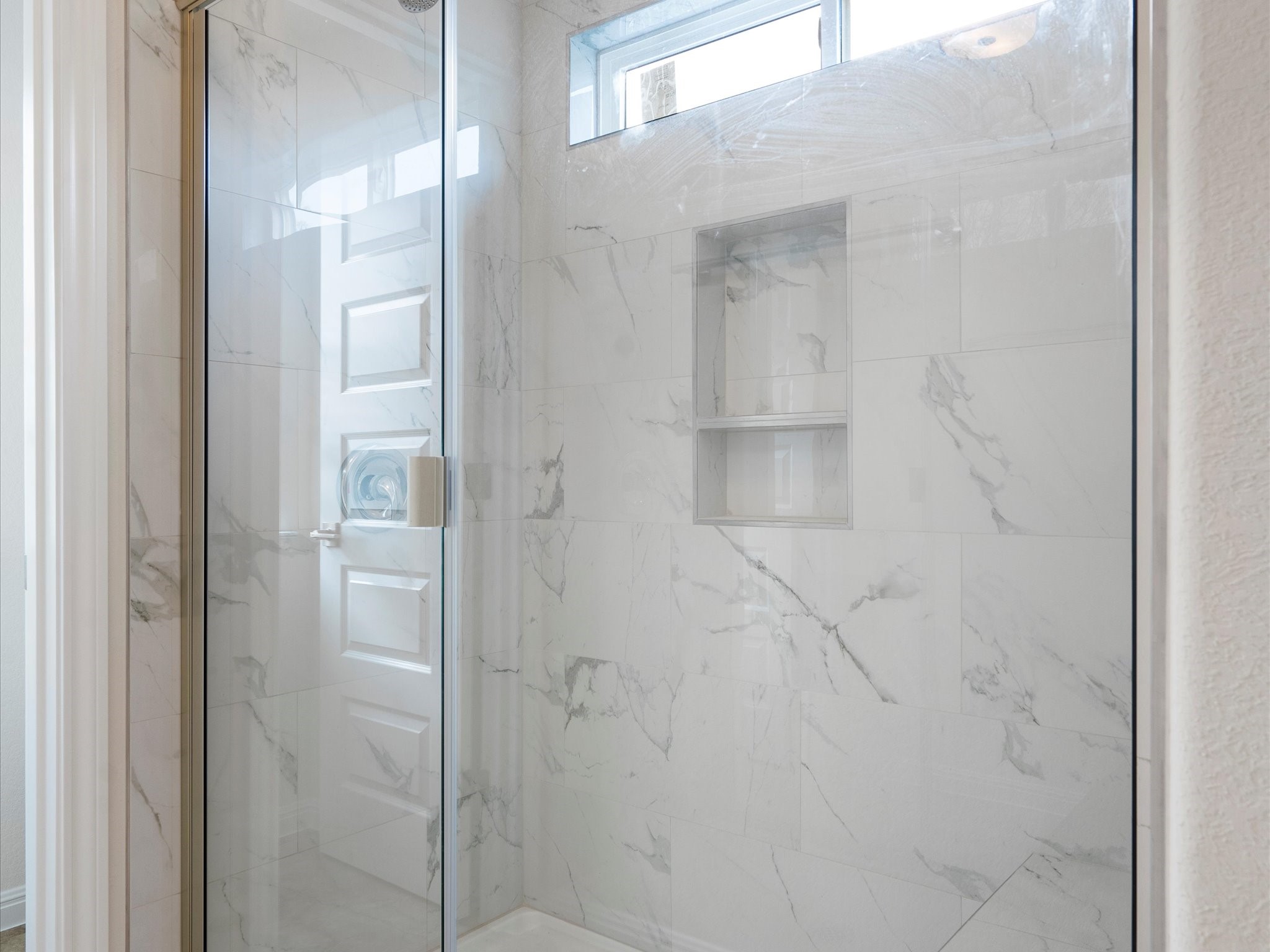 21007 Coleman Branch Creek Road Manor, TX 78653 - Photo 26 of 30 Primary bathroom with walk-in shower and modern finishes.