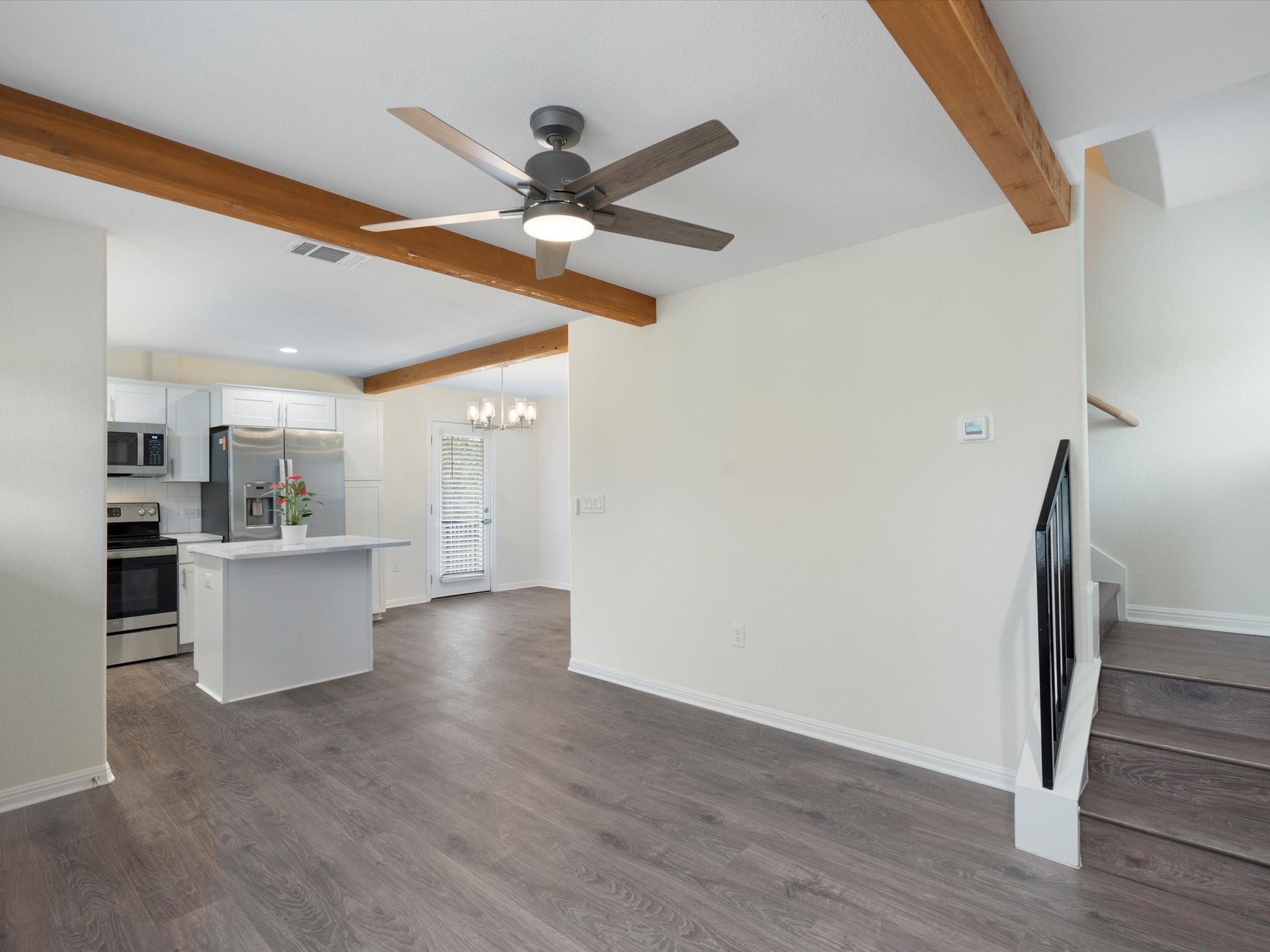 21007 Coleman Branch Creek Road Manor, TX 78653 - Photo 8 of 30 Open living area with natural light and views of the surrounding property.