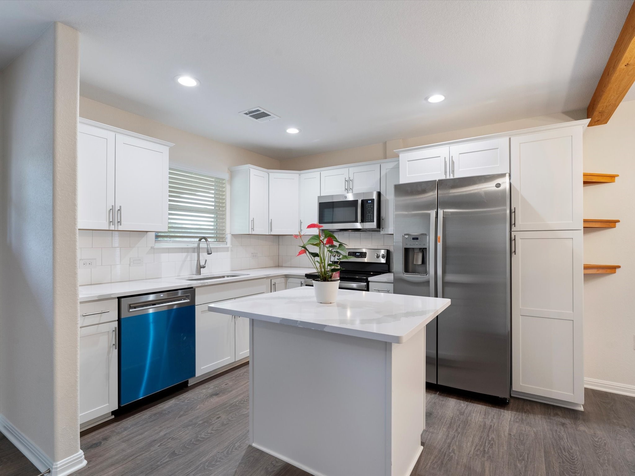 21007 Coleman Branch Creek Road Manor, TX 78653 - Photo 10 of 30 Kitchen with center island and stainless steel appliances.