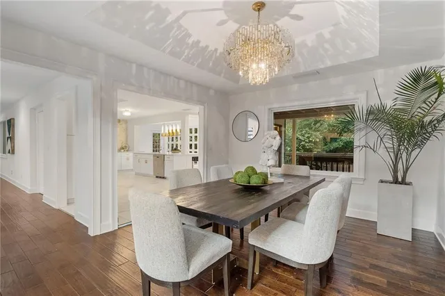 a kitchen with a sink and a stove top oven