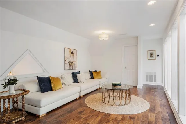 a bedroom with a large bed and a closet