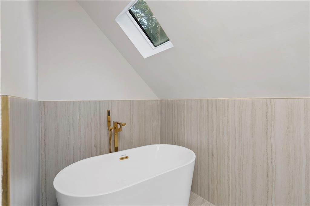 11260 Houze Road Roswell, GA 30076 - Photo 51 of 60 a bathroom with a white wall