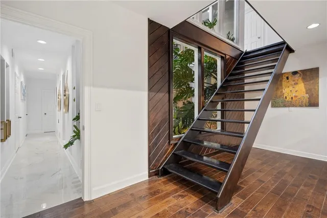 a room with a bed and a window