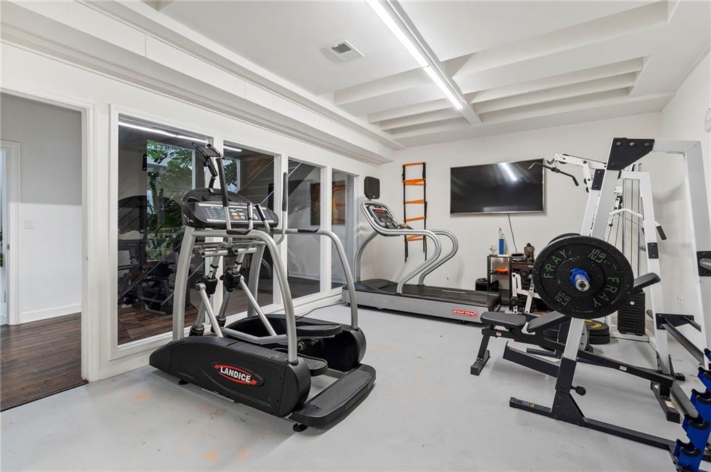 11260 Houze Road Roswell, GA 30076 - Photo 54 of 60 a view of a room with gym equipment