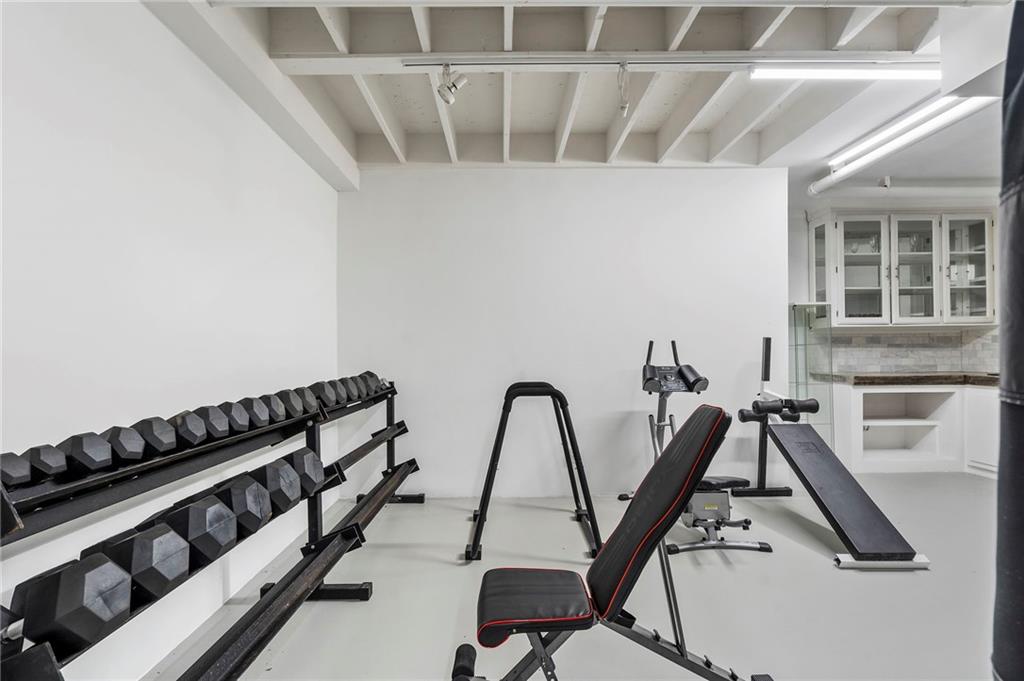 11260 Houze Road Roswell, GA 30076 - Photo 55 of 60 a view of a room with gym equipment