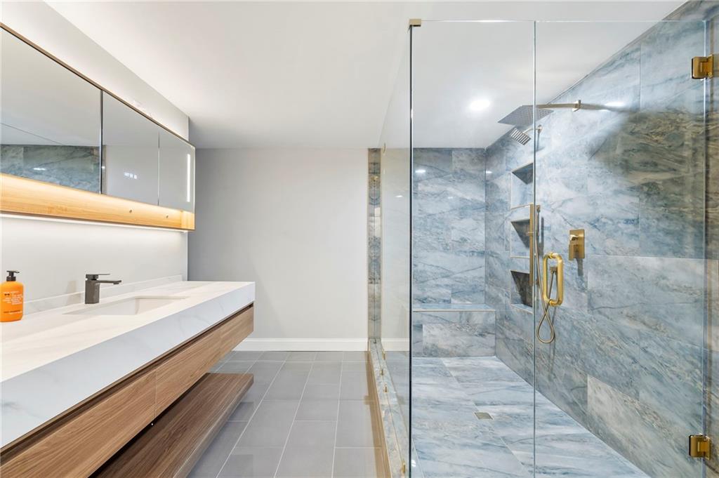 11260 Houze Road Roswell, GA 30076 - Photo 58 of 60 a bathroom with a sink and a shower