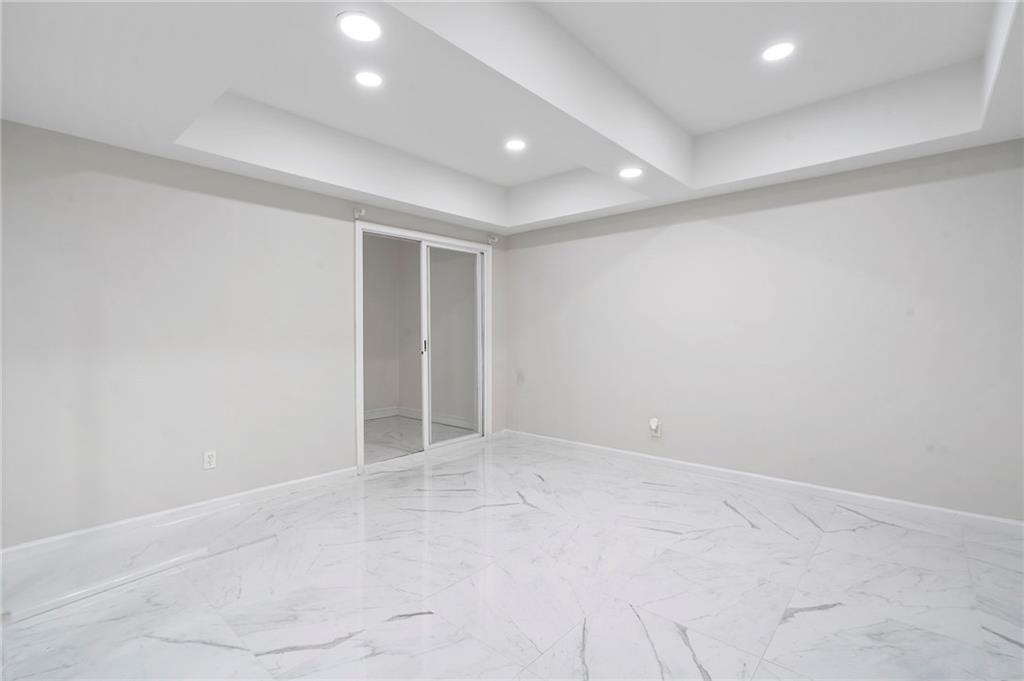 11260 Houze Road Roswell, GA 30076 - Photo 59 of 60 an empty room with an entryway