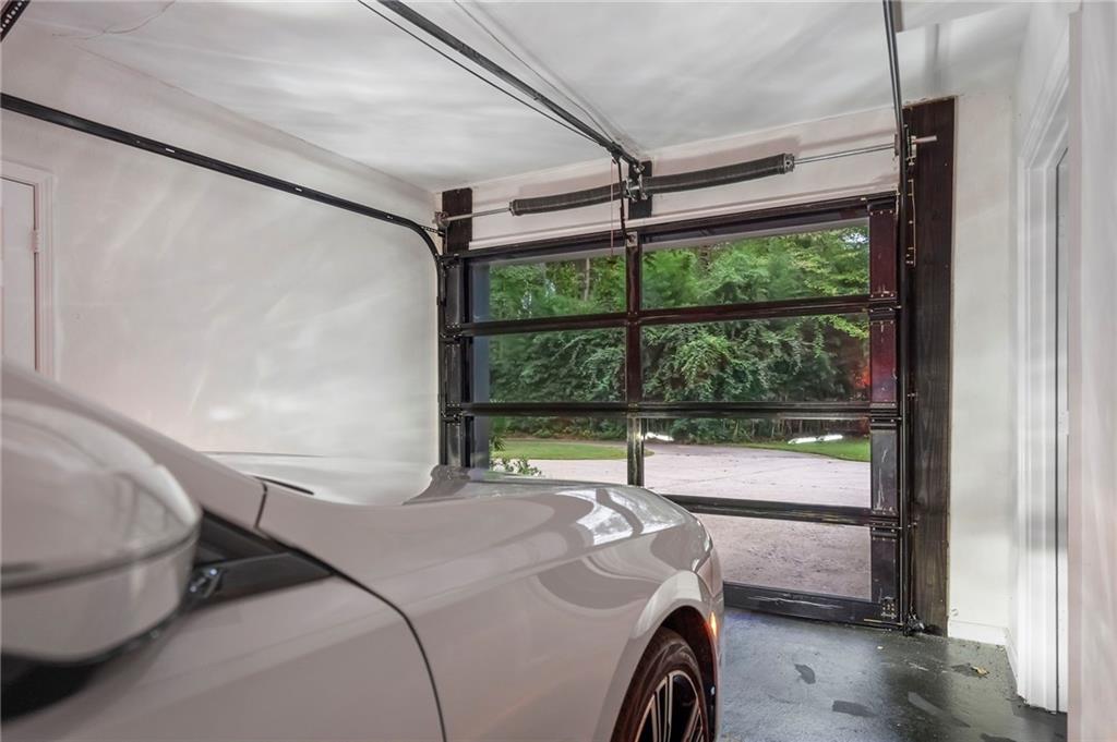 11260 Houze Road Roswell, GA 30076 - Photo 60 of 60 a room with a bed and a window