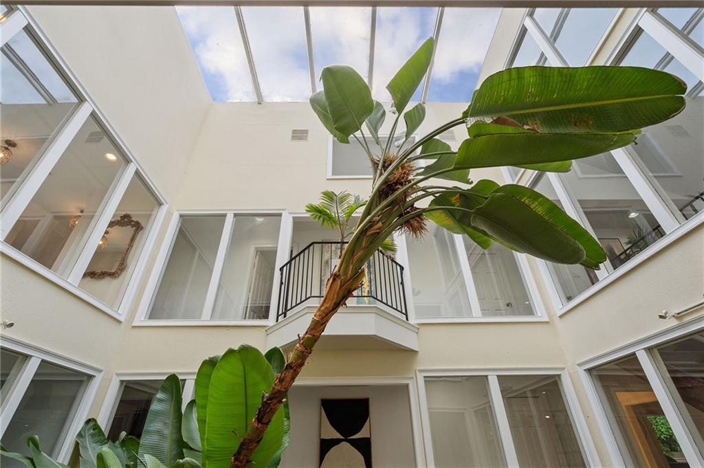 11260 Houze Road Roswell, GA 30076 - Photo 9 of 60 a vase of flowers sitting on a floor