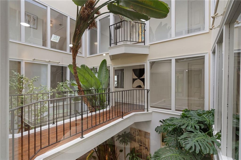 11260 Houze Road Roswell, GA 30076 - Photo 10 of 60 a view of a house with a small yard and wooden floor and fence