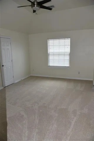 an empty room with a window