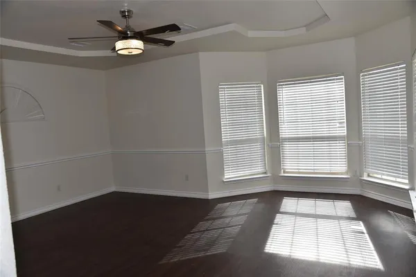 an empty room with a empty space and a window