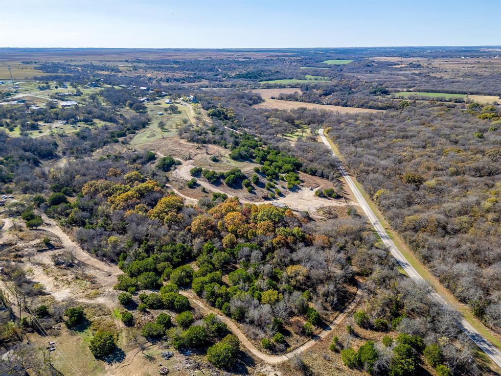 6267 Ben Day Murrin Road Fort Worth, TX 76126 - Photo 5 of 24 an aerial view of a houses with a yard