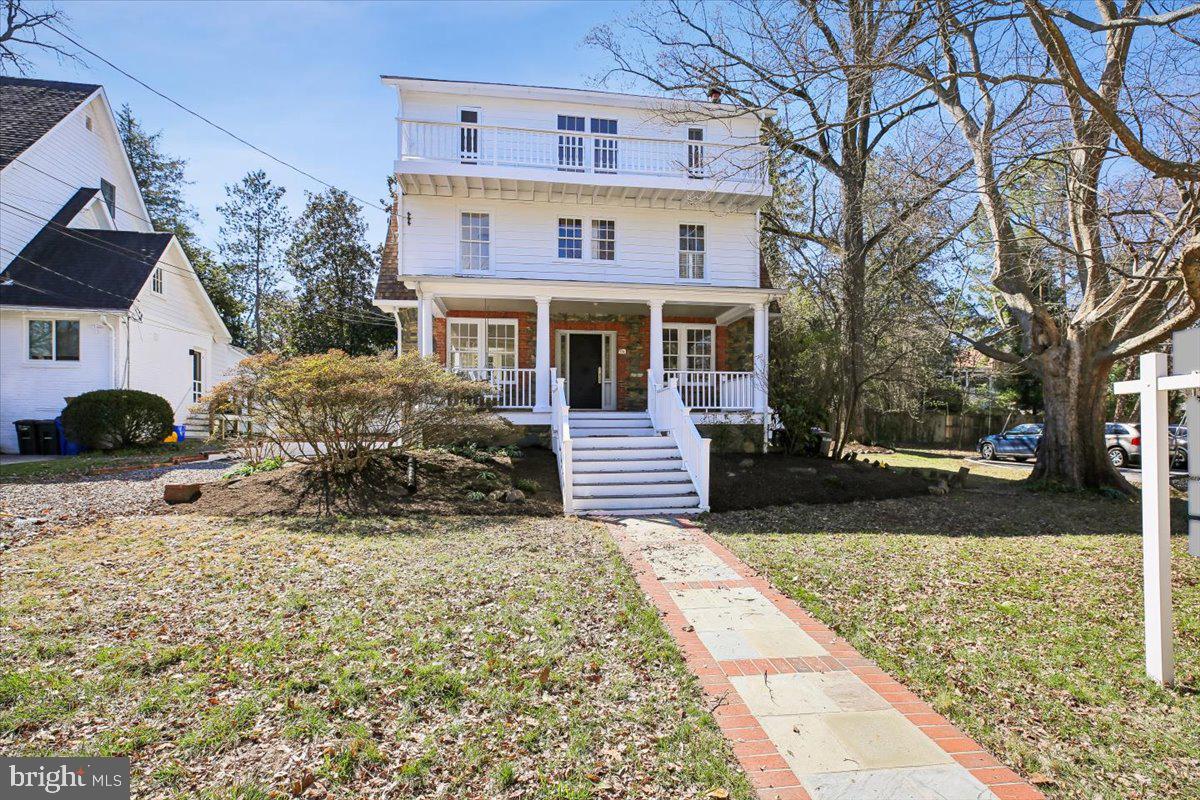 4714 Hunt Avenue Chevy Chase, MD 20815 - Photo 1 of 54 a view of a house with a yard