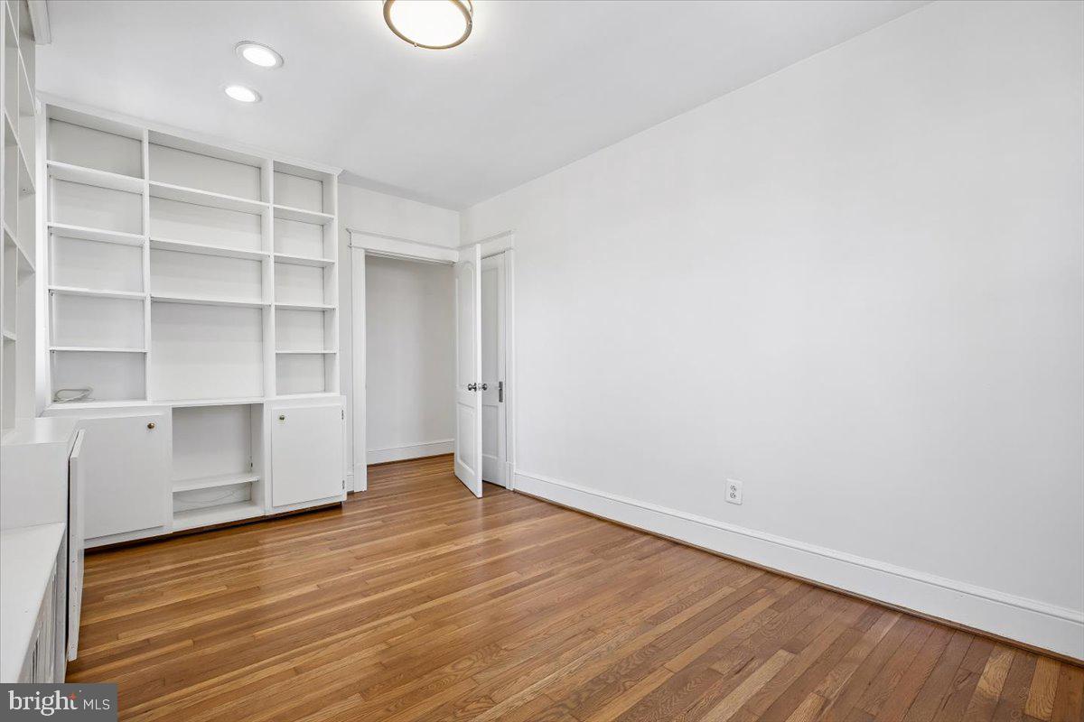 4714 Hunt Avenue Chevy Chase, MD 20815 - Photo 19 of 54 a view of an empty room with wooden floor and closet