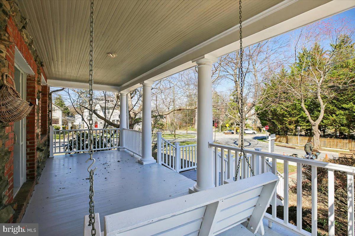 4714 Hunt Avenue Chevy Chase, MD 20815 - Photo 2 of 54 a view of porch with a floor to ceiling window and wooden floor