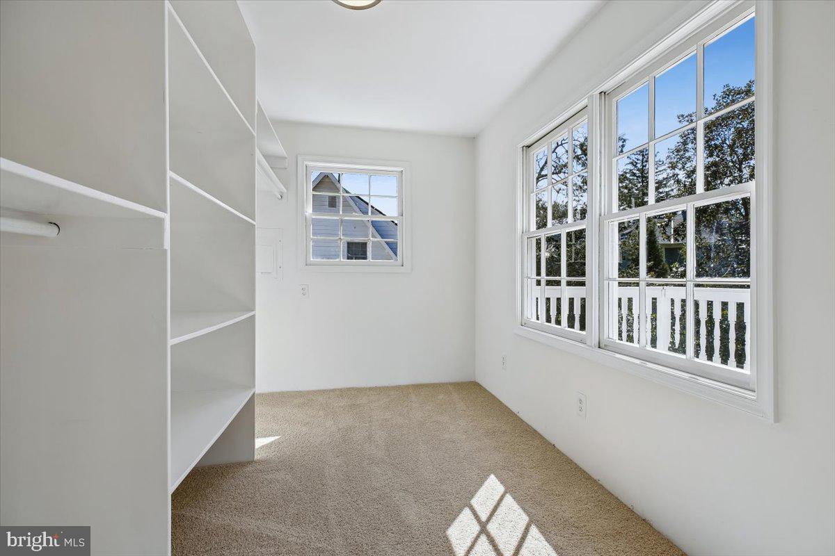 4714 Hunt Avenue Chevy Chase, MD 20815 - Photo 32 of 54 a view of a hallway with windows