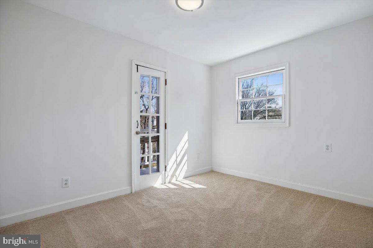 4714 Hunt Avenue Chevy Chase, MD 20815 - Photo 33 of 54 a view of a livingroom with furniture and a window