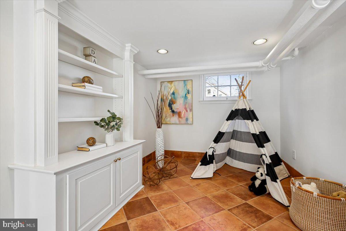 4714 Hunt Avenue Chevy Chase, MD 20815 - Photo 42 of 54 a view of a workspace with furniture and toys
