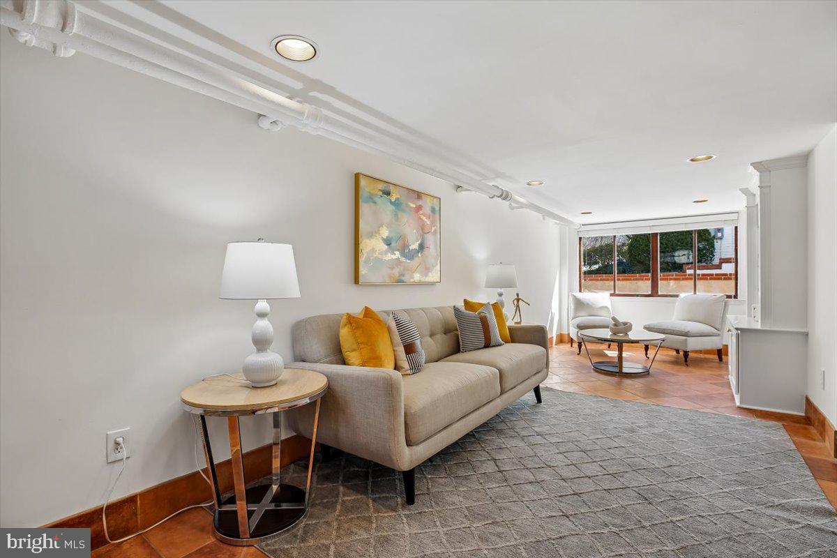 4714 Hunt Avenue Chevy Chase, MD 20815 - Photo 43 of 54 a living room with furniture and a table