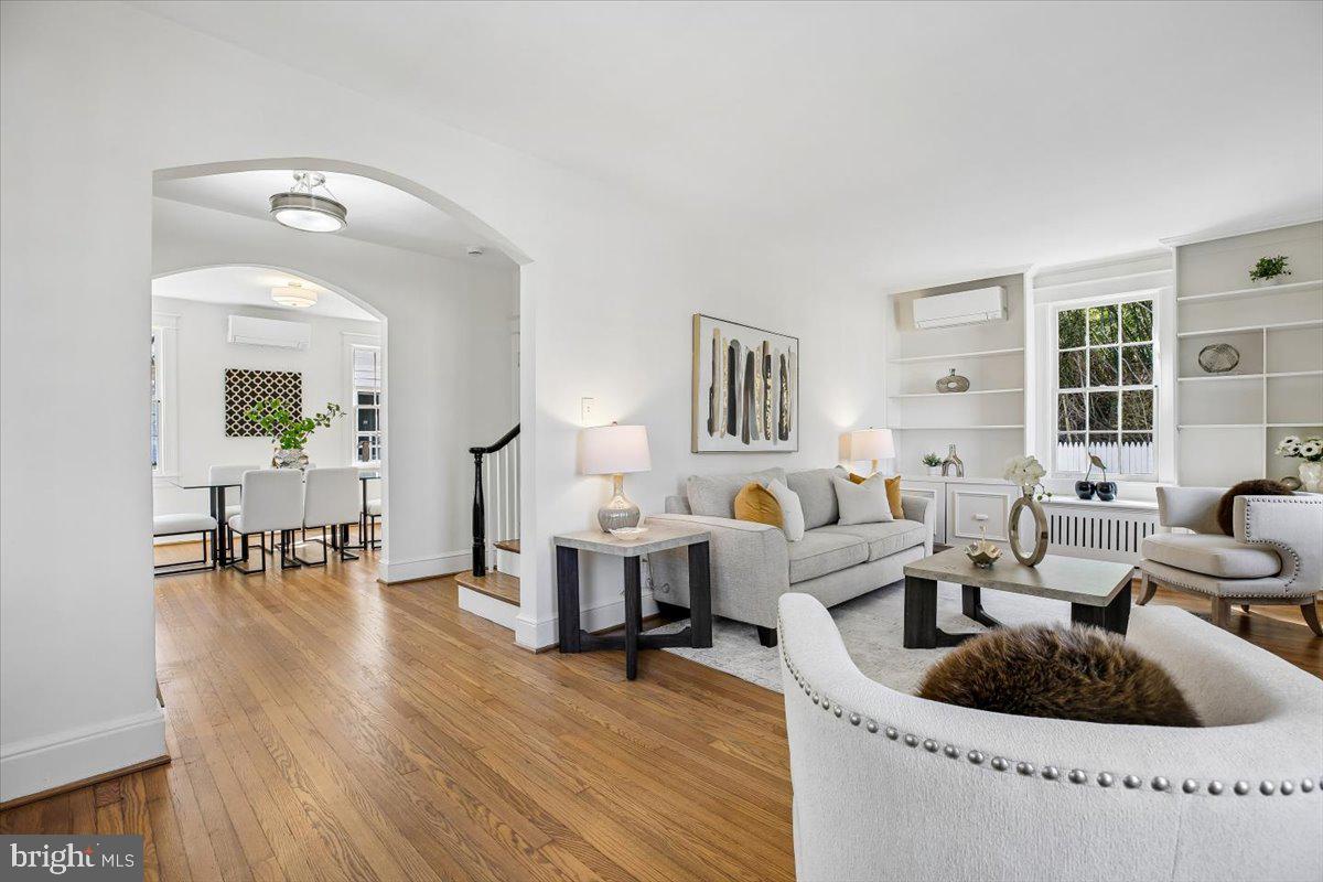 4714 Hunt Avenue Chevy Chase, MD 20815 - Photo 8 of 54 a living room with furniture and a large window