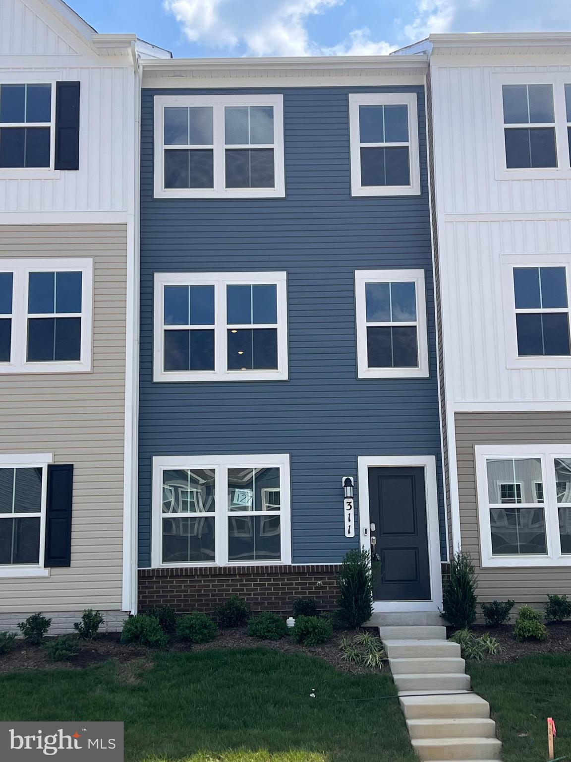 311 Sandy Btm Circle Ranson, WV 25438 - Photo 2 of 33 a front view of a house